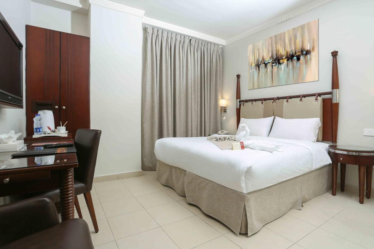 Retaj Hotel Аман Екстериор снимка