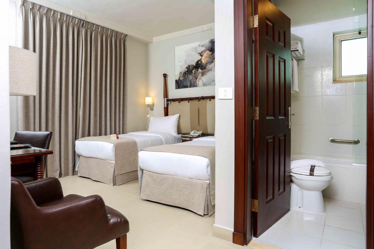 Retaj Hotel Аман Екстериор снимка