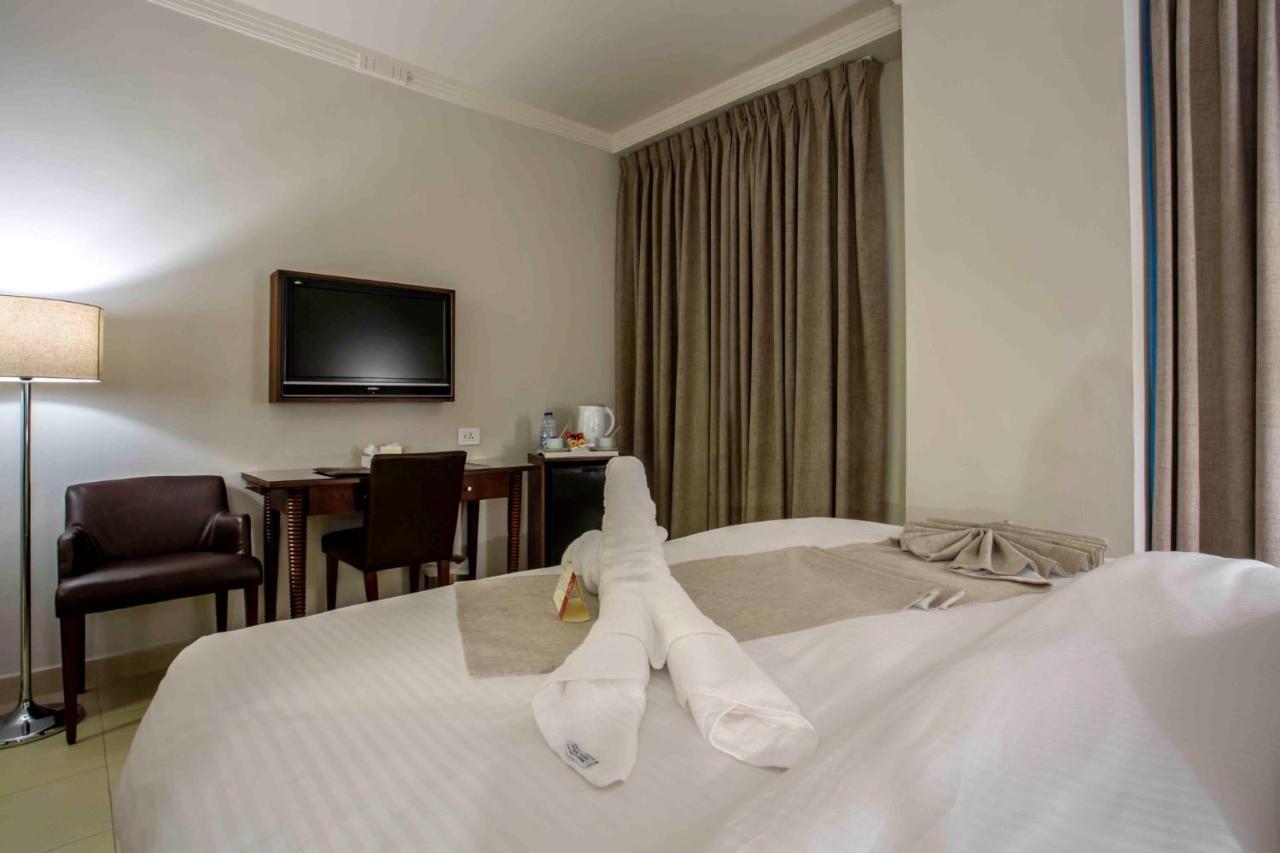 Retaj Hotel Аман Екстериор снимка