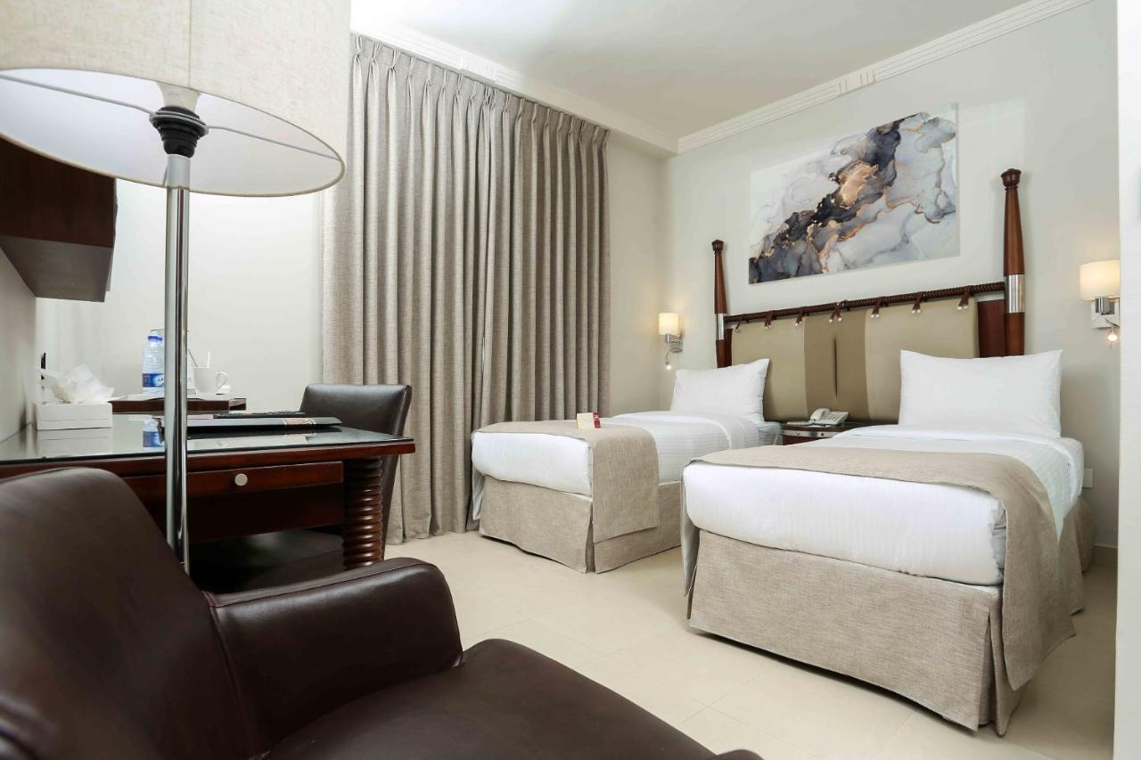 Retaj Hotel Аман Екстериор снимка