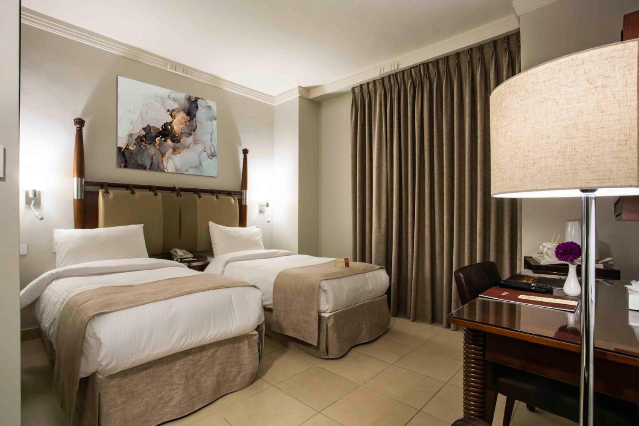 Retaj Hotel Аман Екстериор снимка