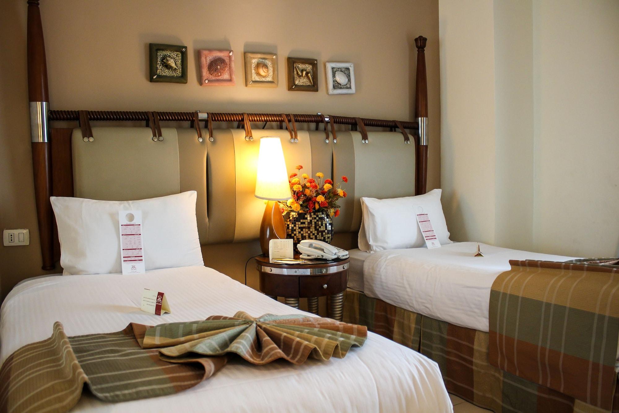 Retaj Hotel Аман Екстериор снимка