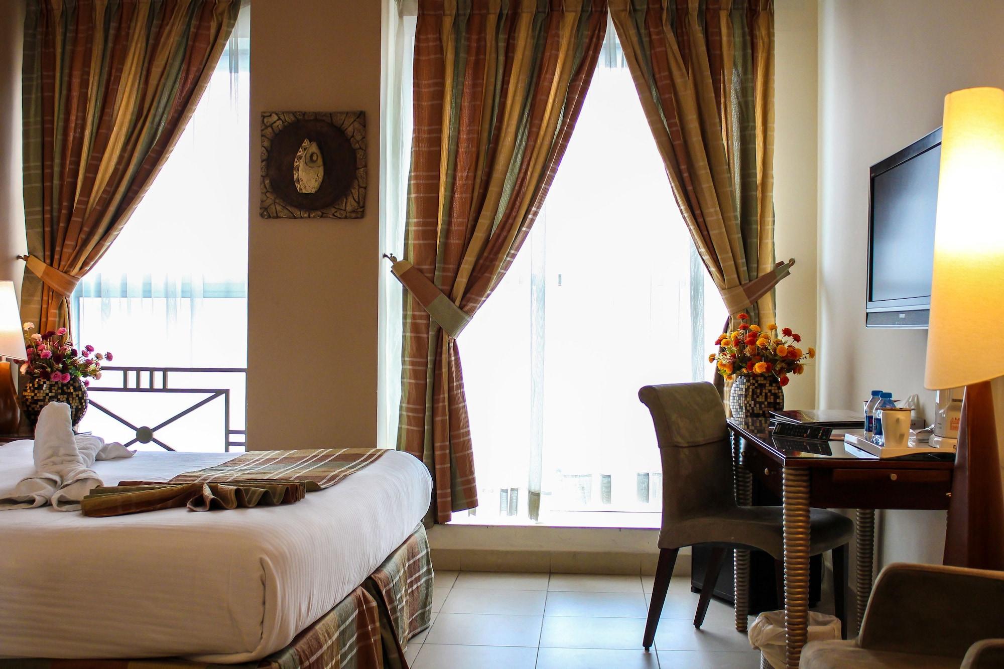 Retaj Hotel Аман Екстериор снимка